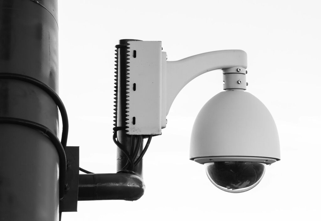 Security dome camera mounted on a post