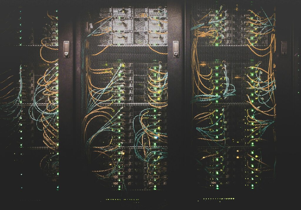 Server racks with network cabling in a data center
