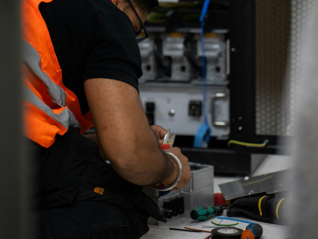 Technician working on server equipment